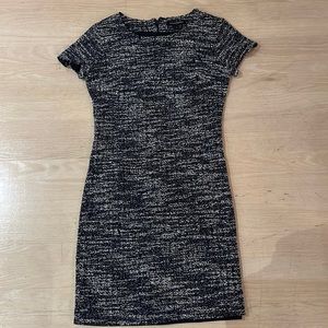 Slub knit short sleeve knee length dress. Excellent used condition.